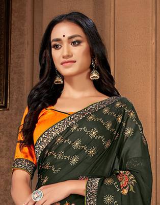 Dark green printed georgette saree with blouse 3