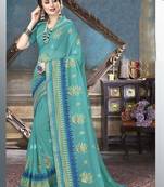 Sea green embroidered georgette saree with blouse