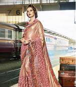 Peach embroidered lycra saree with blouse