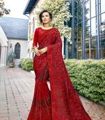 Red embroidered silk saree with blouse