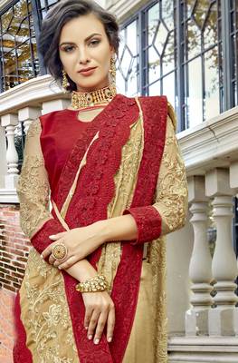 Beige embroidered georgette saree with blouse 2