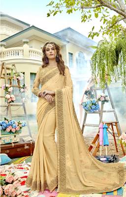 Cream embroidered chiffon saree with blouse 1