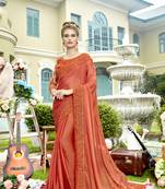 Orange embroidered chiffon saree with blouse