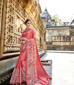 Pink embroidered crepe saree with blouse