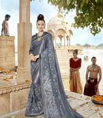 Grey embroidered lycra saree with blouse