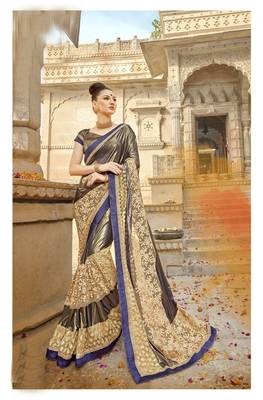 Beige embroidered lycra saree with blouse 1