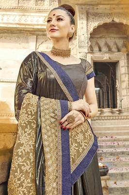 Beige embroidered lycra saree with blouse 2