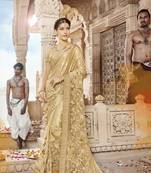 Cream embroidered lycra saree with blouse