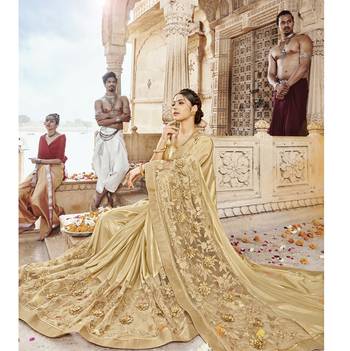 Cream embroidered lycra saree with blouse 2