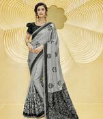 Grey embroidered georgette saree with blouse