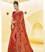 Orange embroidered silk saree with blouse