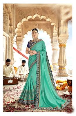 Green embroidered georgette saree with blouse 1