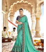 Green embroidered georgette saree with blouse