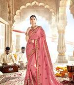 Peach embroidered georgette saree with blouse