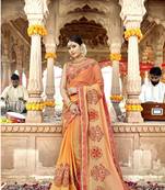 Orange embroidered georgette saree with blouse