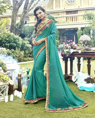 Sea green embroidered silk saree with blouse 1