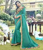 Sea green embroidered silk saree with blouse