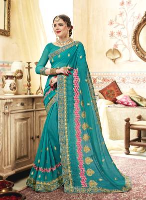 Sea green embroidered georgette saree with blouse 1