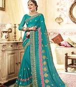 Sea green embroidered georgette saree with blouse