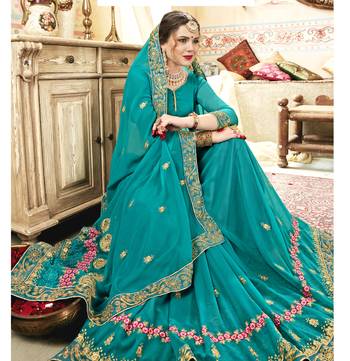 Sea green embroidered georgette saree with blouse 2