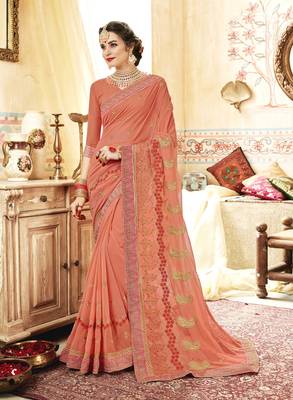 Peach embroidered georgette saree with blouse 1