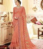 Peach embroidered georgette saree with blouse