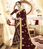 Brown embroidered georgette saree with blouse