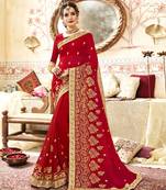 Red embroidered georgette saree with blouse
