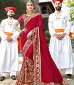 Red embroidered silk saree with blouse