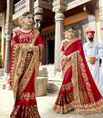 Red embroidered silk saree with blouse