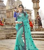 Sea green embroidered georgette saree with blouse