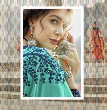 Sea green embroidered georgette saree with blouse 2