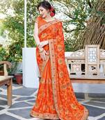 Orange embroidered georgette saree with blouse