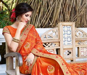 Orange embroidered georgette saree with blouse 2