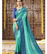 Sea green embroidered silk saree with blouse