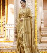 Beige embroidered silk saree with blouse