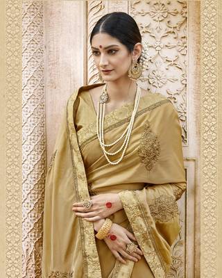 Beige embroidered silk saree with blouse 2