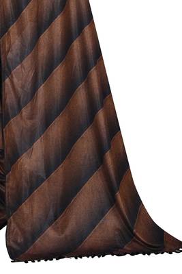 Brown printed lycra saree with blouse 5