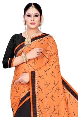 Orange printed lycra saree with blouse 4