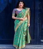 Green woven banarasi silk saree with blouse