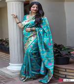 Light green woven banarasi silk saree with blouse