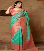 Green woven banarasi silk saree with blouse