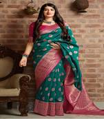 Green woven banarasi silk saree with blouse