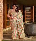 Cream woven banarasi silk saree with blouse