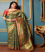 Green woven banarasi silk saree with blouse