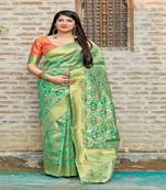 Light green woven banarasi silk saree with blouse