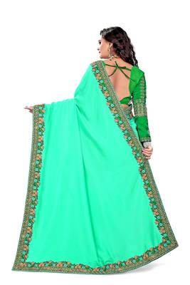 Dark green embroidered silk saree with blouse 2