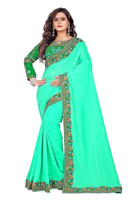 Dark green embroidered silk saree with blouse 3