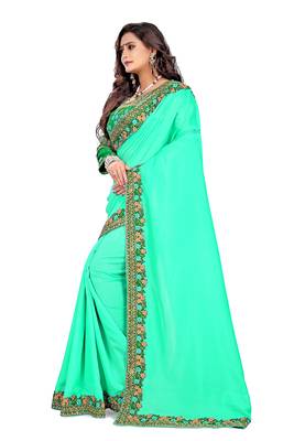 Dark green embroidered silk saree with blouse 4