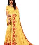 Yellow embroidered silk saree with blouse